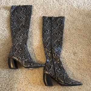 Knee high snake print boots